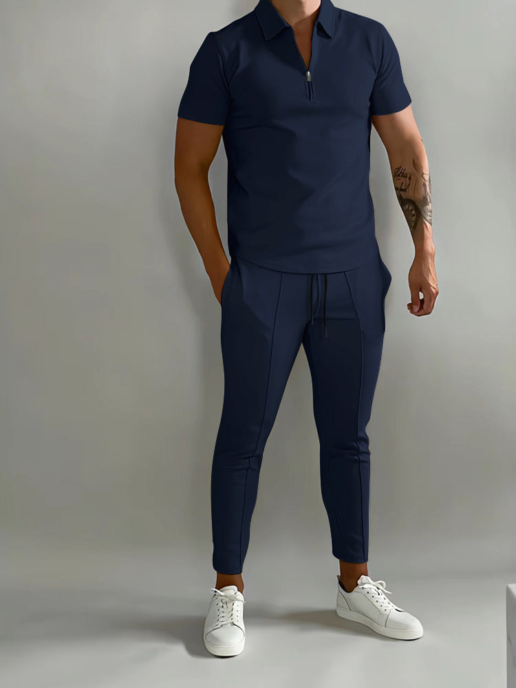 Men's activewear matching set featuring a quarter-zip polo shirt and comfortable track pants. Stylish.