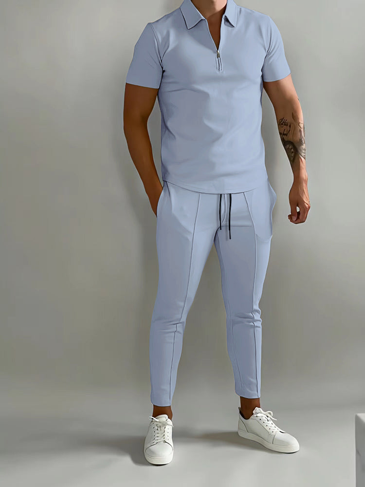 Effortless style with this men's two-piece polo shirt and pants set. Versatile for casual or active wear.