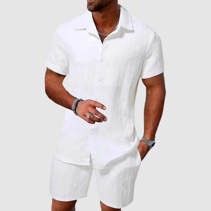 Coordinated men's fashion: casual button down shirt and matching shorts. Ideal summer outfit for resort wear.