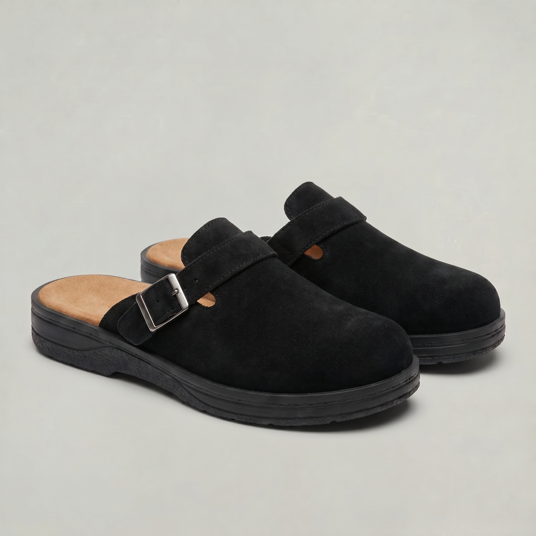 Comfortable men's slip-on mule clogs with adjustable buckle strap, ideal casual footwear for relaxed everyday style.