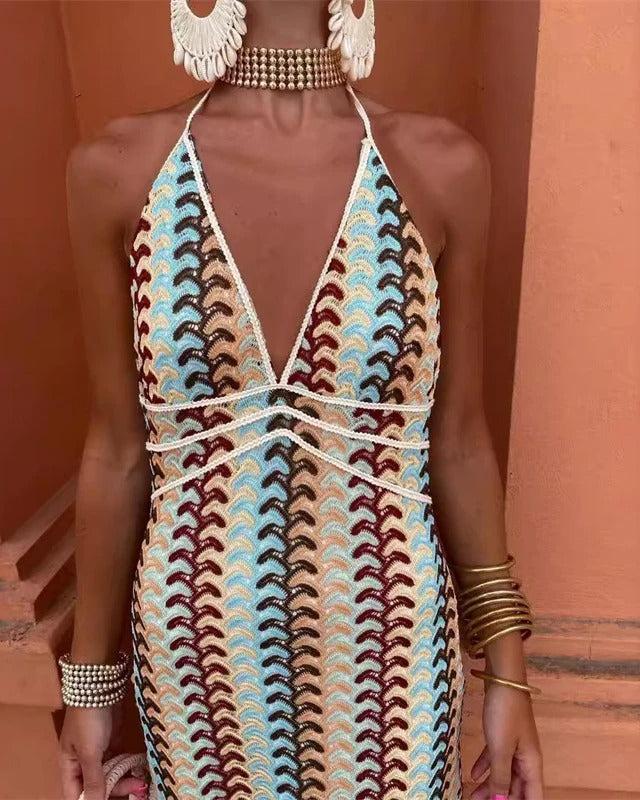 Sophisticated women's halter maxi dress with cutout details, ideal for elegant summer evening events.