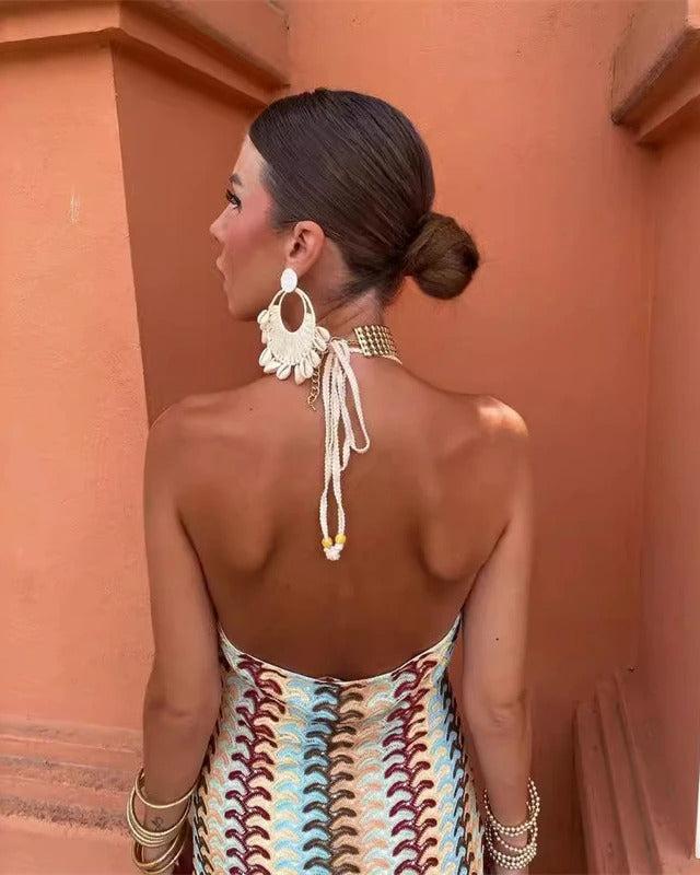 Elegant women's halter maxi dress, a perfect summer wedding guest outfit, chic and comfortable.