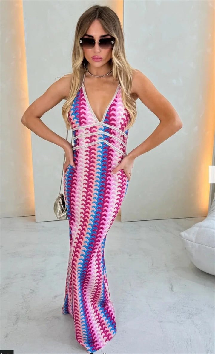 Versatile women's halter maxi dress, flowy and chic, perfect for elegant summer weddings or evening wear.