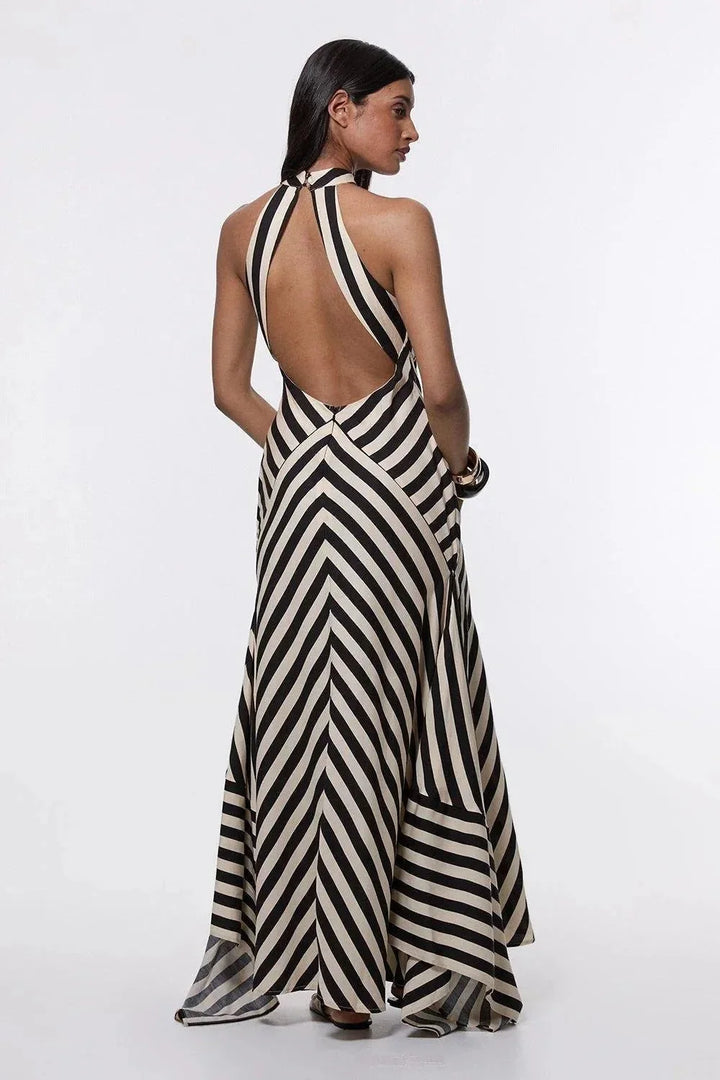 Stylish women's chevron stripe formal maxi dress featuring a sophisticated halter neckline and flowing design.