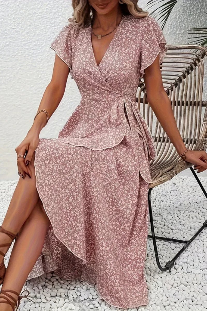 Stylish floral midi dress for women, elegant wrap design with tiered skirt for parties.