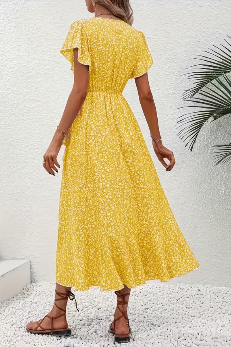 Vibrant floral wrap midi dress with flutter sleeves, a must-have for summer fashion.
