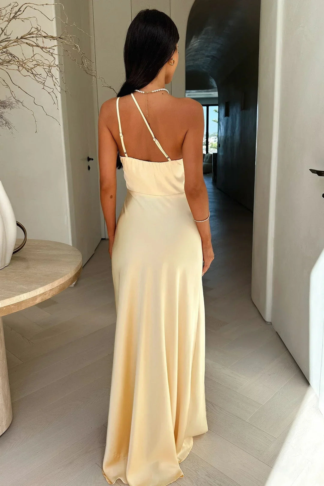 Elegant light brown one-shoulder maxi dress for women. Features a high slit, perfect for formal and party wear.