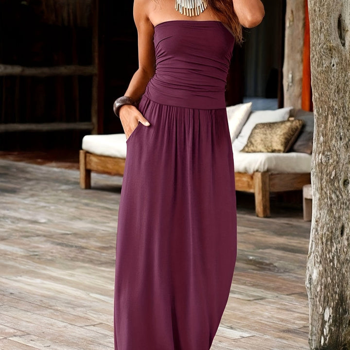 Fashionable evening wear bandeau midi dress with a flattering waist-cinching design.