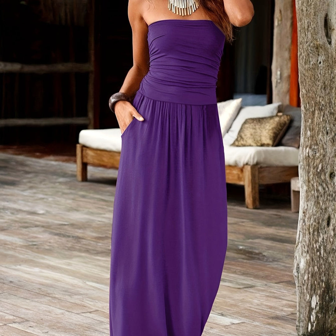 Women's bandeau midi dress with practical pockets, combining fashion & function.
