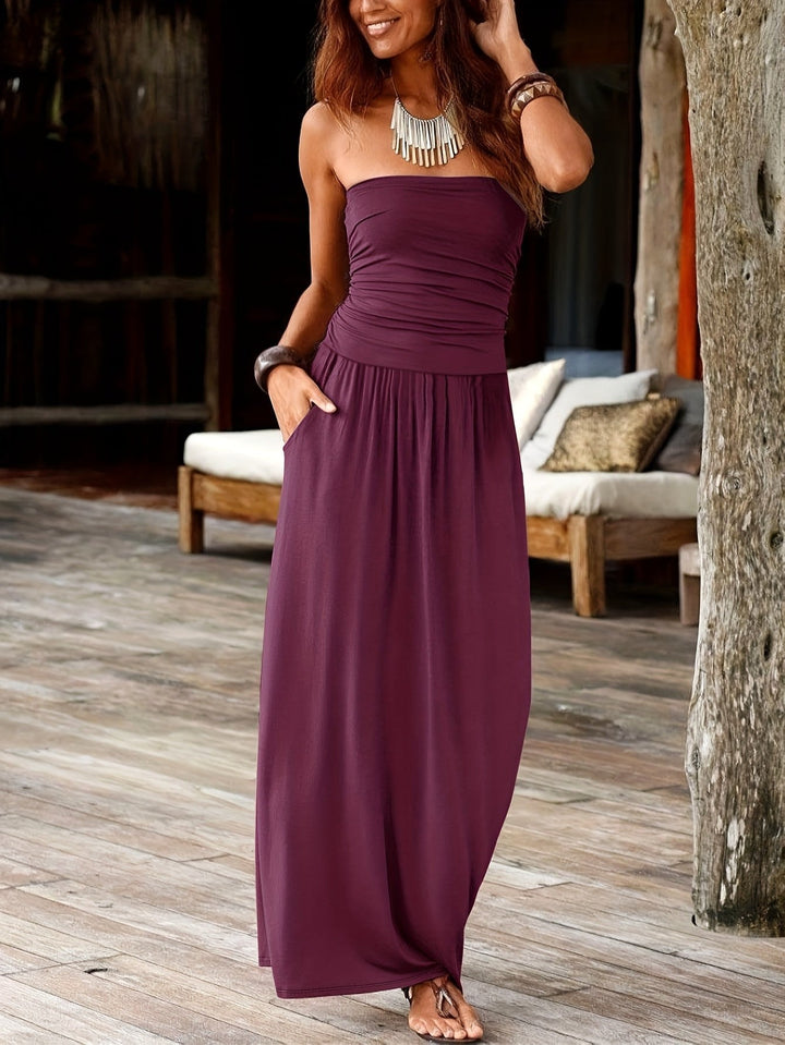 Flattering women's bandeau midi dress with a cinched waist, suitable for day to night.