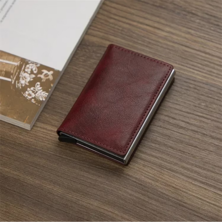 Side view of a slim men's aluminum cardholder wallet with an integrated money clip.