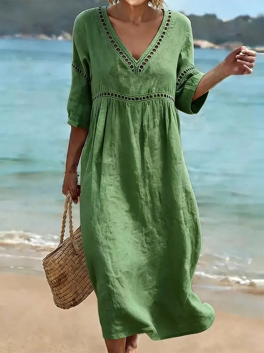 Women's fluid v-neck midi dress, perfect for elegant casual wear and comfortable spring/summer fashion.