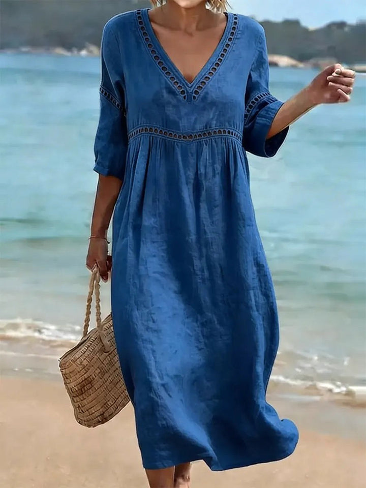 V-neck fluid midi dress for women, a comfortable and elegant choice for spring, summer, and casual occasions.