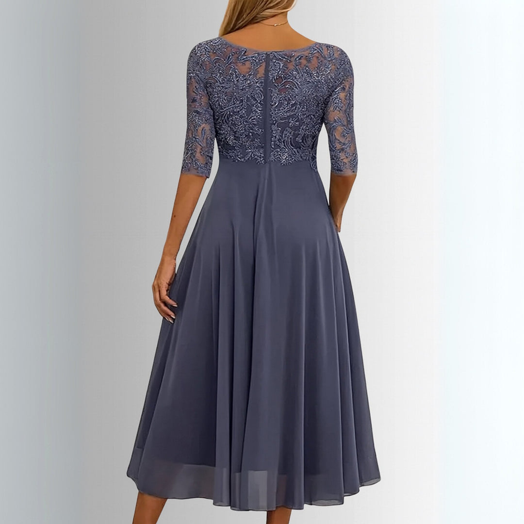 Elegant women's midi dress. Flattering occasionwear for special events, parties, and summer weddings.