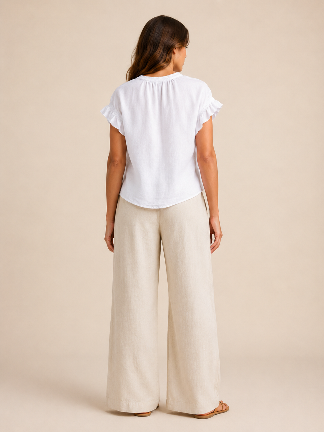 Pink everyday wear V-neck blouse for women, featuring a relaxed fit and ruffle sleeves.