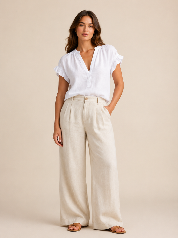 Pink spring fashion V-neck top, a women's blouse with relaxed fit and timeless cap sleeves.