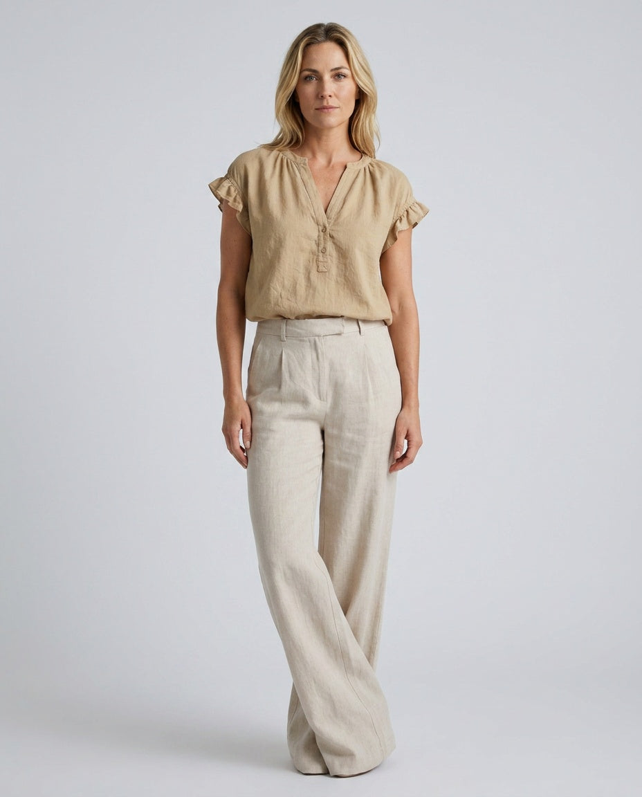 Pink V-Neck Blouse with elegant ruffle cap sleeves, a versatile top for spring and summer.