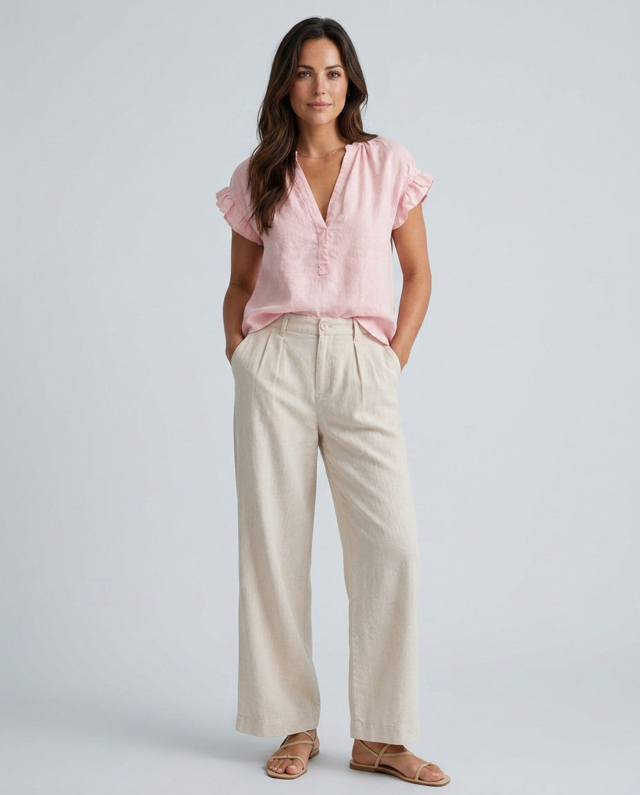 White women's top with flattering V-neck and stylish cap sleeves, great for versatile fashion.