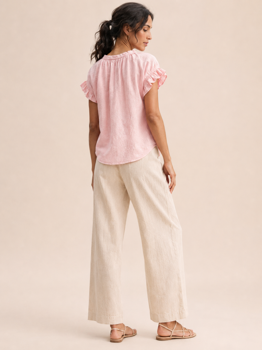 Beige casual women's blouse, a relaxed fit V-neck top with comfortable ruffle sleeves.