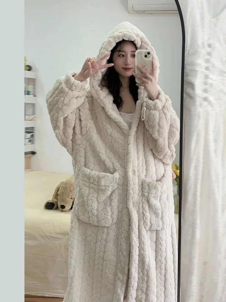 Amy Nightfall hooded bathrobe for women, ultra-cozy winter loungewear for ultimate warmth and comfort.