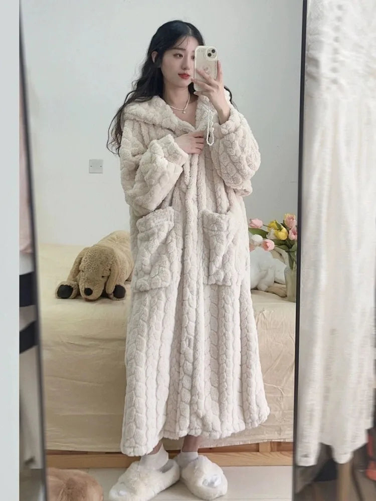 Soft and warm women's Amy Nightfall bathrobe featuring a comfortable hood, perfect for home wear.