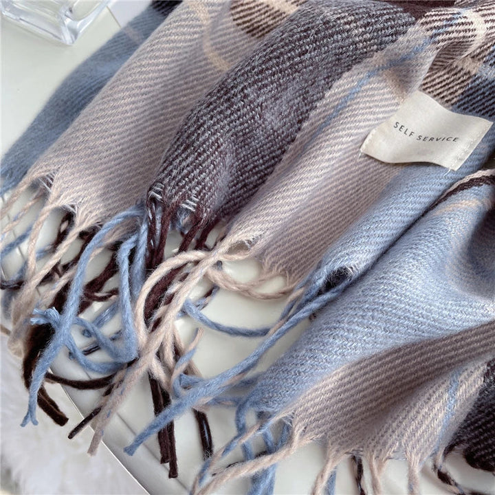 Elegant knitted checkered scarf for women, a stylish and warm cashmere-blend accessory for winter fashion.