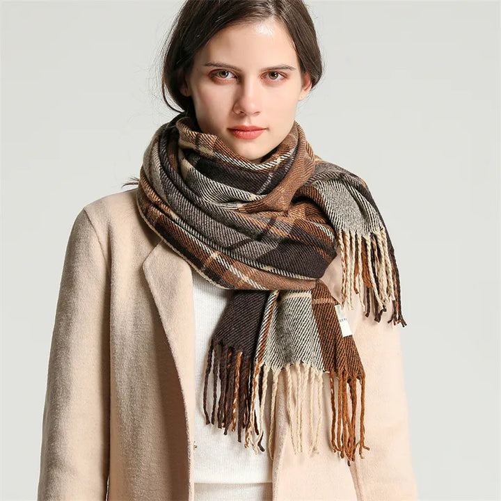 Women's chic knitted checkered scarf, gracefully draped, highlighting its warm and stylish design.