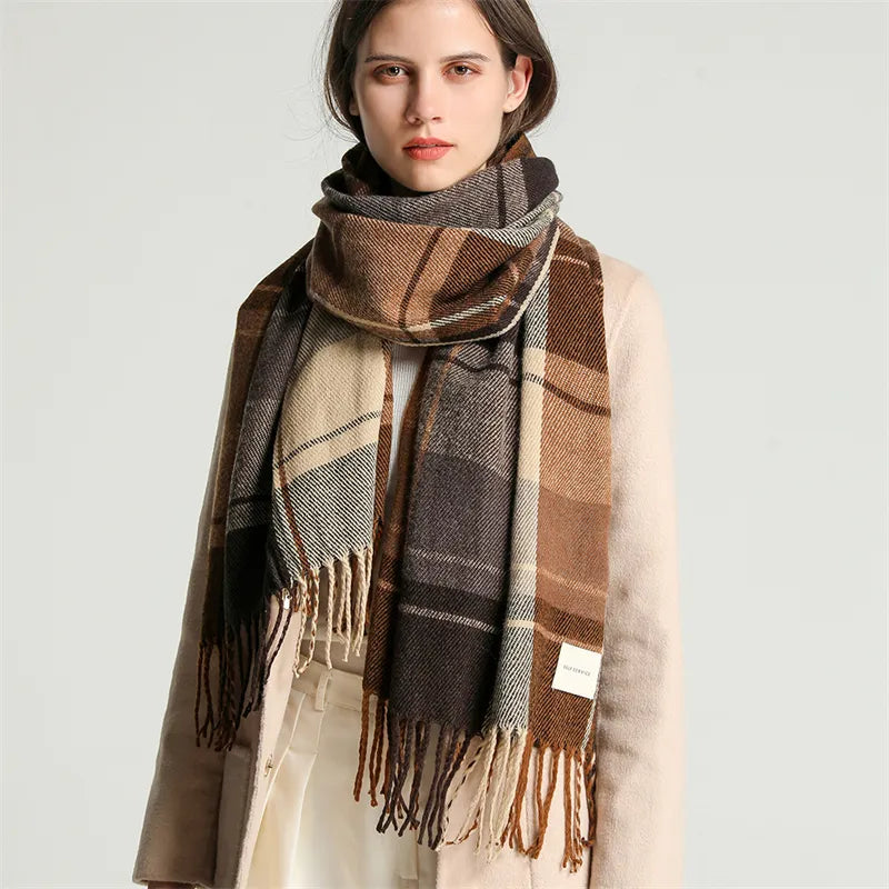 Detail shot of a trendy women's knitted checkered scarf, showcasing its quality and winter warmth.