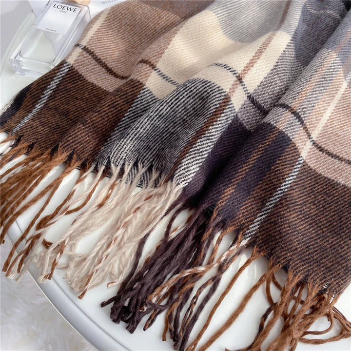 Elegant women's knitted scarf with a chic checkered design, a cozy and fashionable winter accessory.