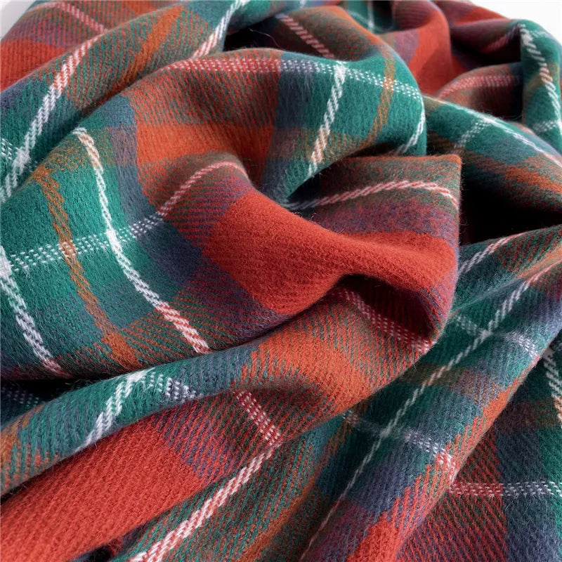 Chic women's knitted checkered scarf, a must-have warm winter accessory for timeless style.