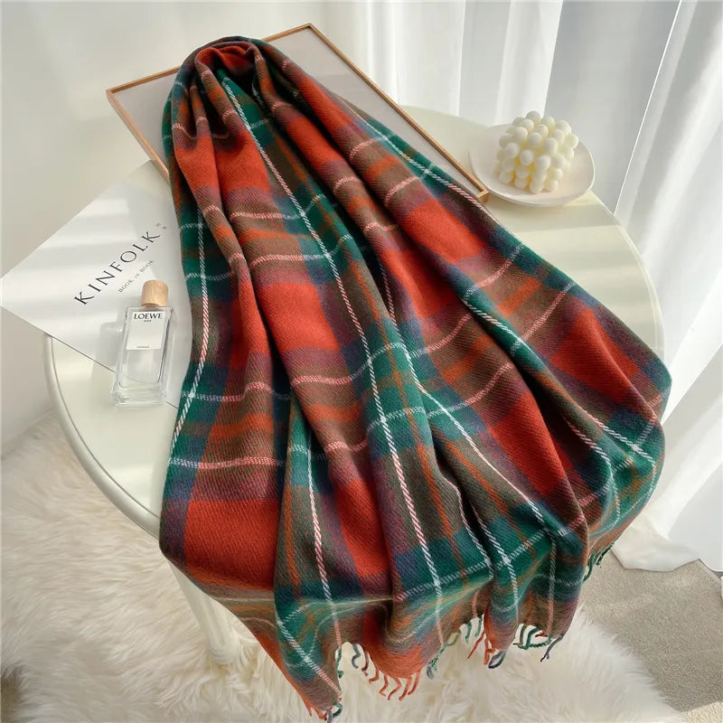 Warm women's winter accessory: a fashionable knitted checkered scarf, ideal for cold weather.