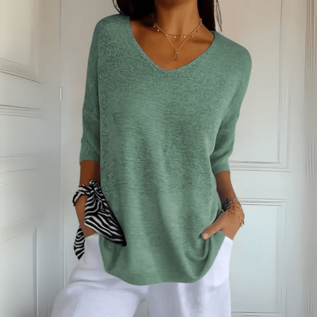 Versatile women's loose fit jumper, a stylish v-neck sweater perfect for daily comfort.