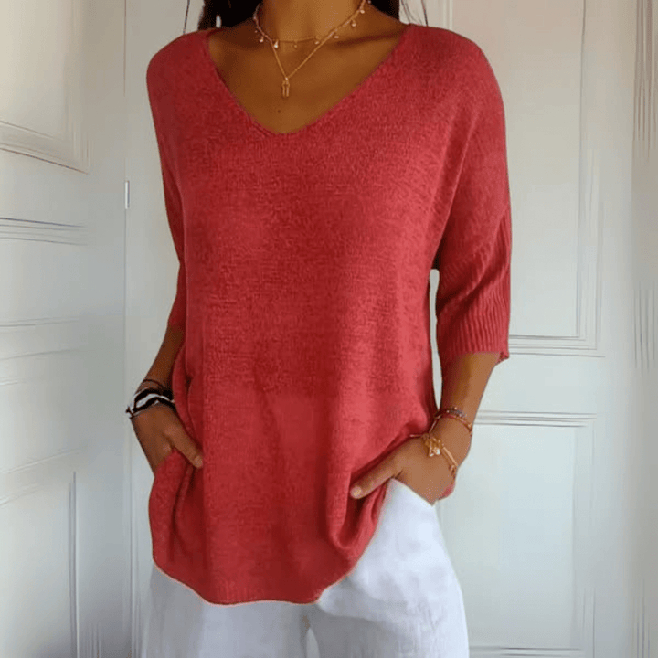 Women's V-neck loose knit sweater, a relaxed comfort jumper for casual everyday wear.