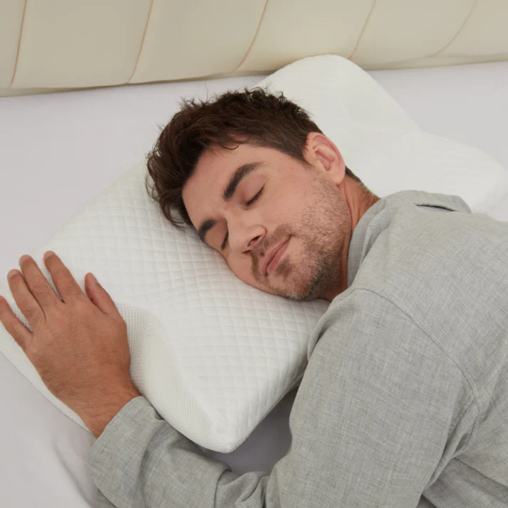 Ergonomic anti-snore pillow for enhanced sleep, offering memory foam comfort & snore reduction.