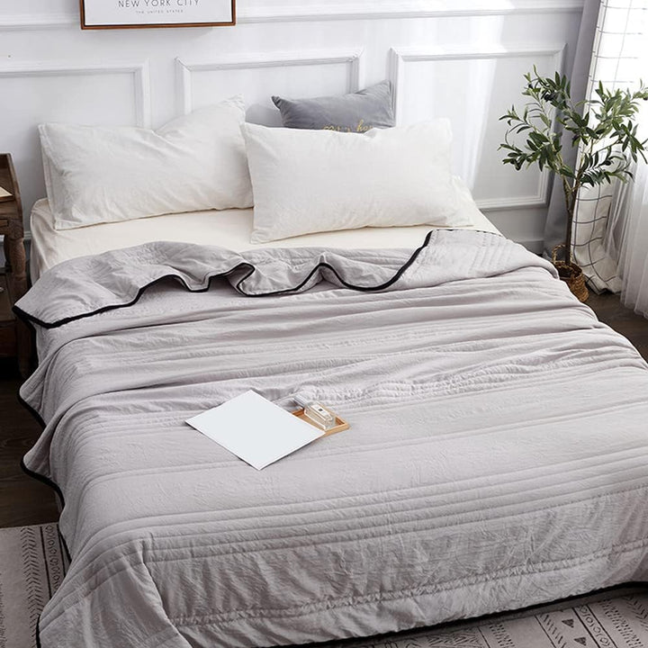 Cooling Comfort Blanket for refreshing sleep. Soft, breathable, and lightweight throw for ultimate relaxation.