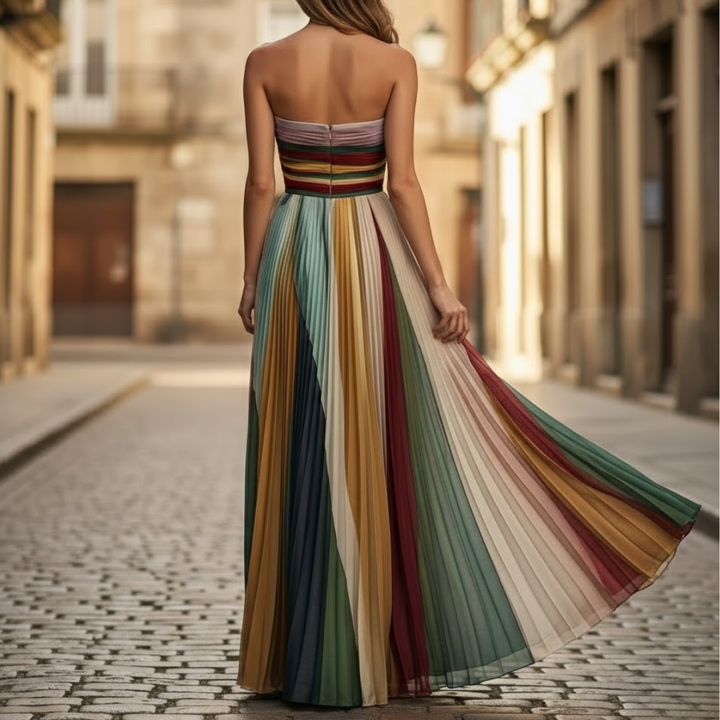 Flowy women's strapless evening maxi dress with delicate pleats, perfect for summer parties.