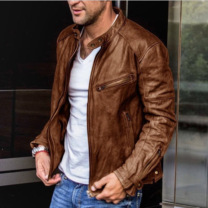 Stylish men's zip-front leather jacket featuring a snap collar. Ideal outerwear for modern casual wear.