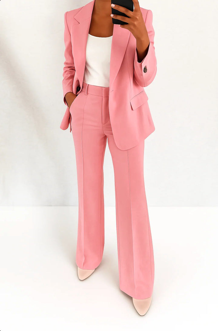 Versatile women's wide-leg trouser suit set. Structured blazer & high-waist pants for elegant business casual style.
