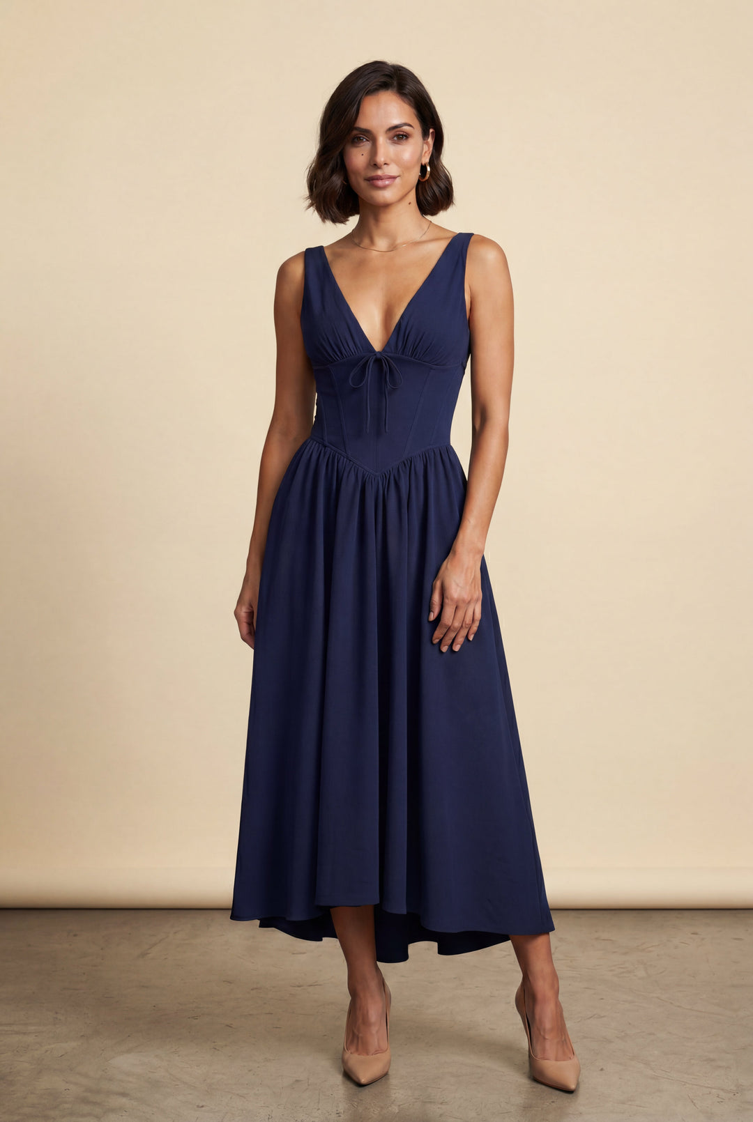 Women's elegant corset bodice midi dress for races, parties, or wedding guests. Flowing skirt, V-neck.