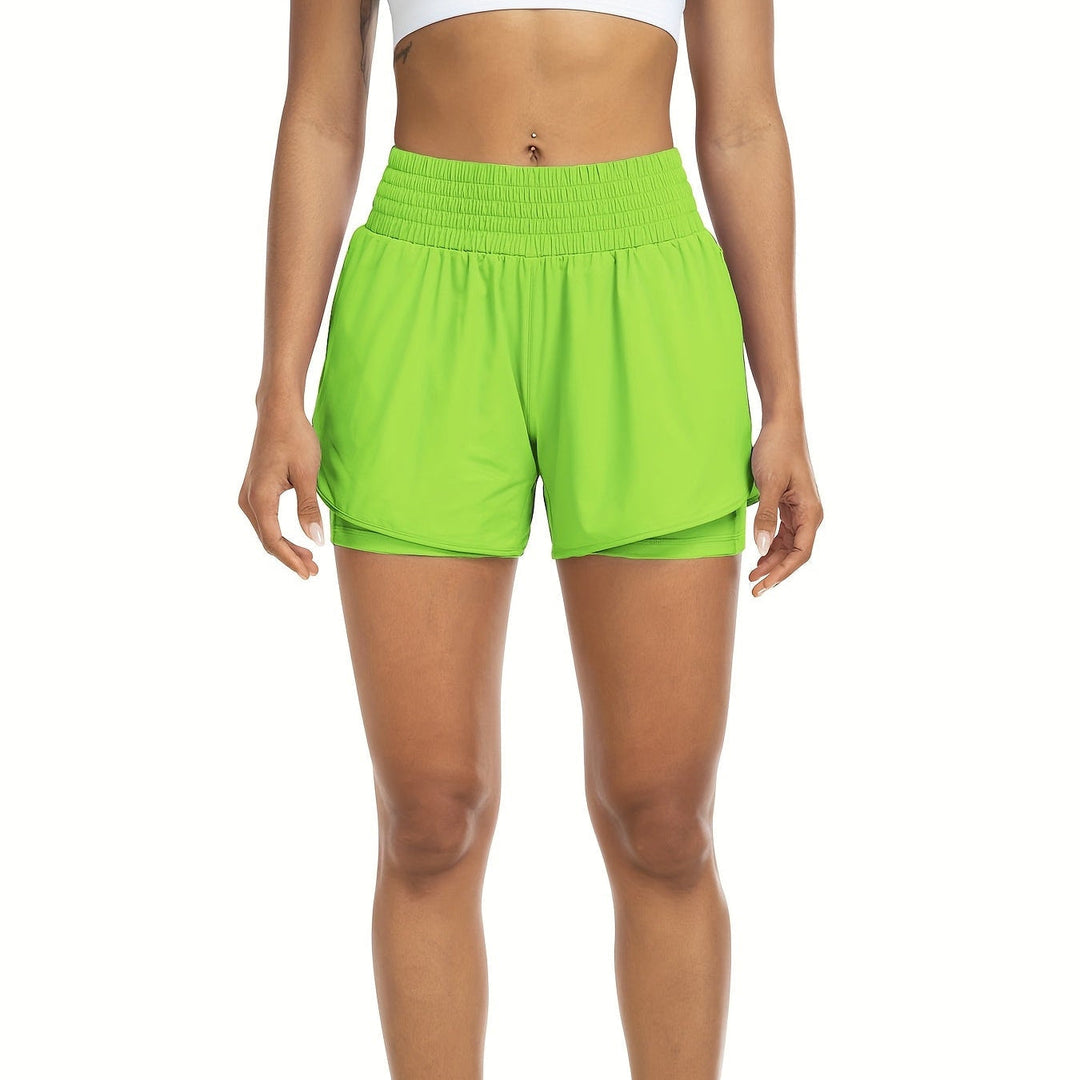 Women's graceful high-waisted activewear shorts, double-layered & perfect for sports.