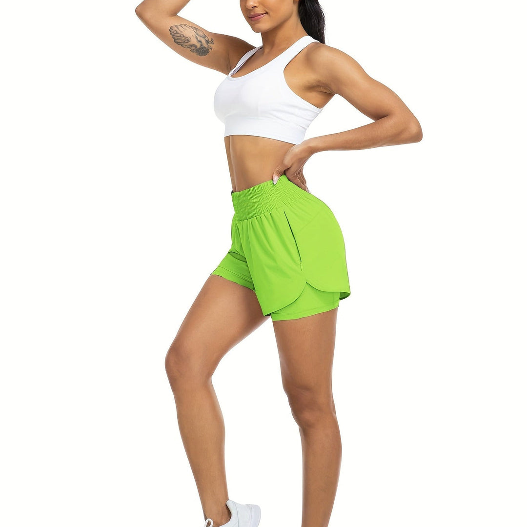 Comfortable women's double-layer sports shorts, high-waisted for training & casual wear.