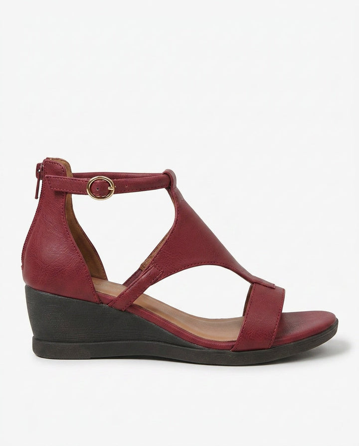 Grey elegant strappy wedge sandals for women. Stylish and comfortable summer footwear.
