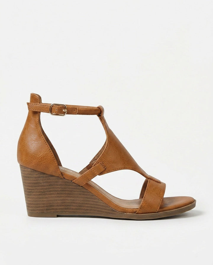 Red women's strappy wedge sandals. Vibrant, comfortable summer dress sandals with wedge heel.