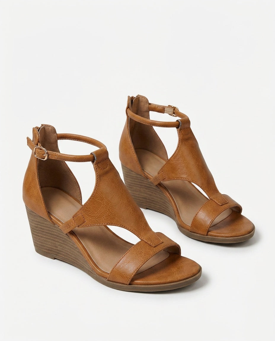 Graceful women's strappy wedge sandals. Elegant, comfortable summer casual footwear.