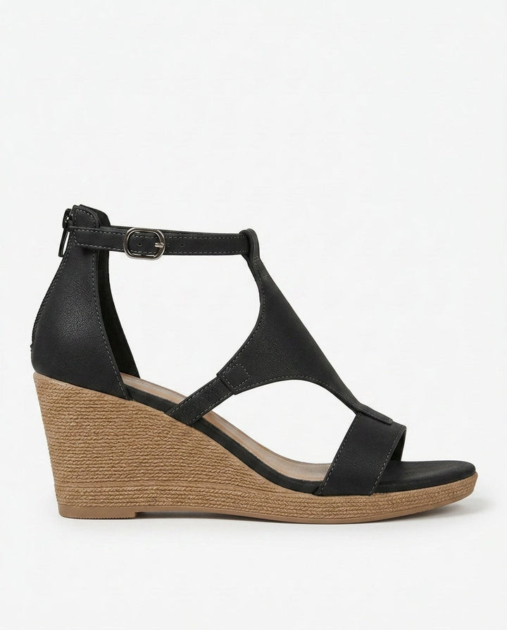 Grey women's strappy wedge sandals. Stylish and comfortable casual summer footwear.