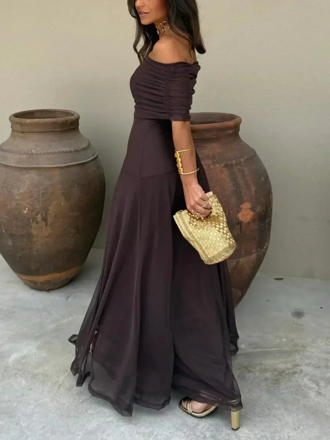 Sophisticated brown off-the-shoulder maxi dress for women, ideal as an evening gown or formal party wear.