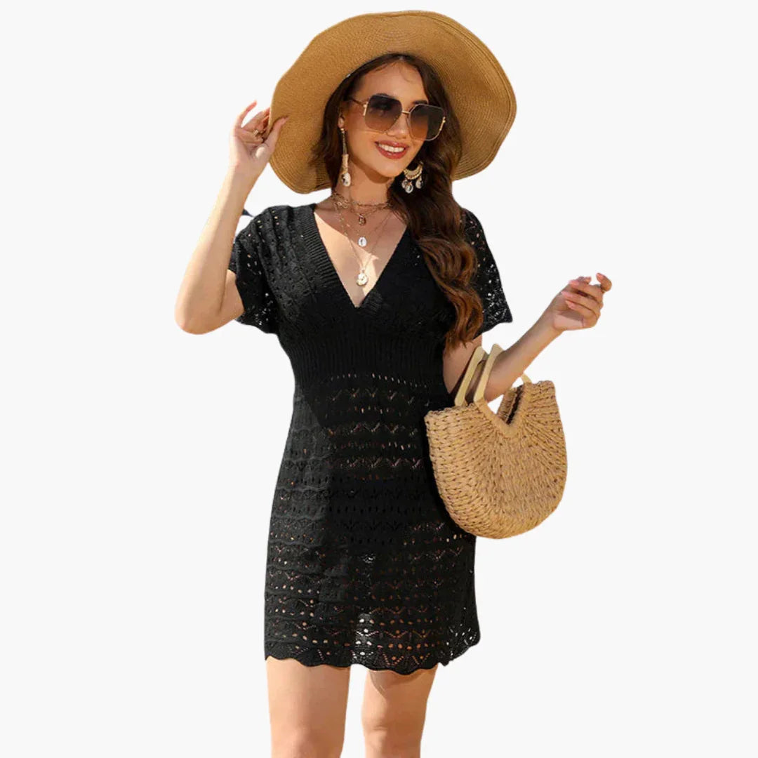 Stylish women's crochet mini dress, plunge neck design. A sophisticated summer beach & vacation essential.