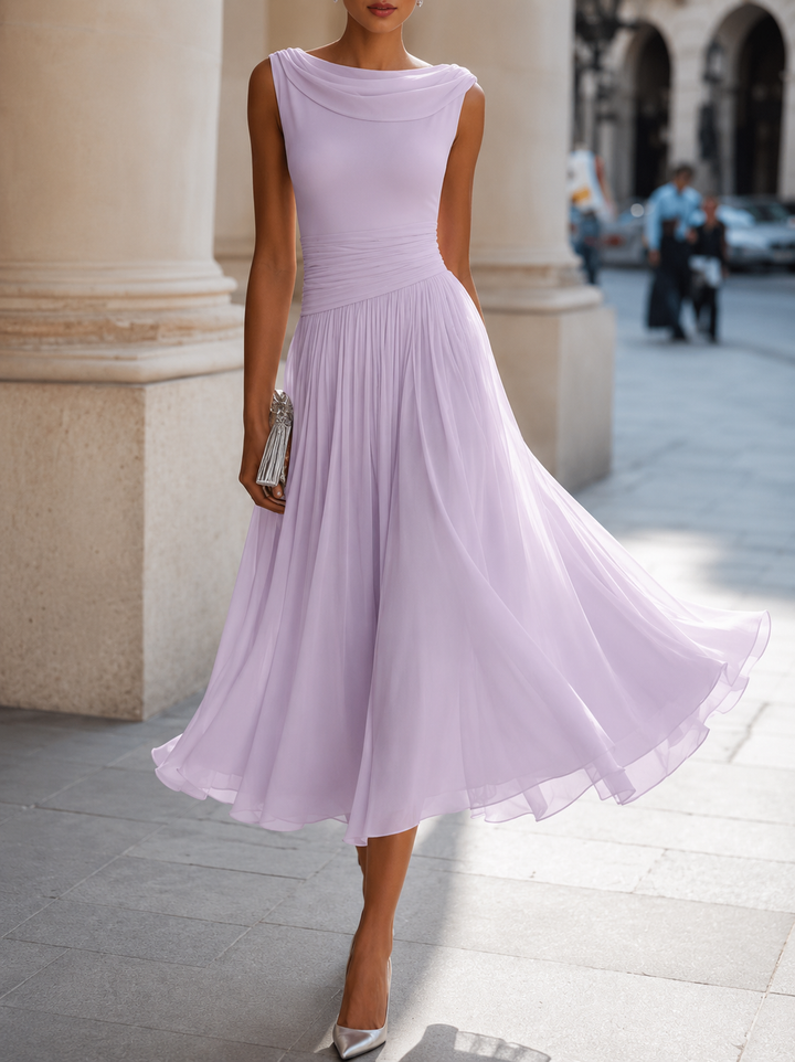 Stylish wedding guest midi dress with elegant draping, ideal for formal events, race day, or garden parties.