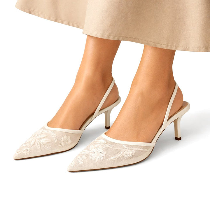 Women's embroidered mule heels with pointed toe, perfect for elegant occasions & parties.