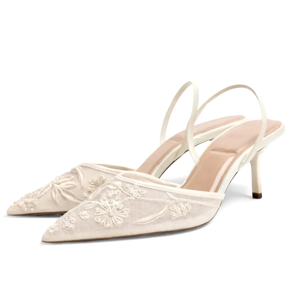 Sophisticated women's pointed toe mule heels, featuring intricate embroidery, ideal for formal dress.